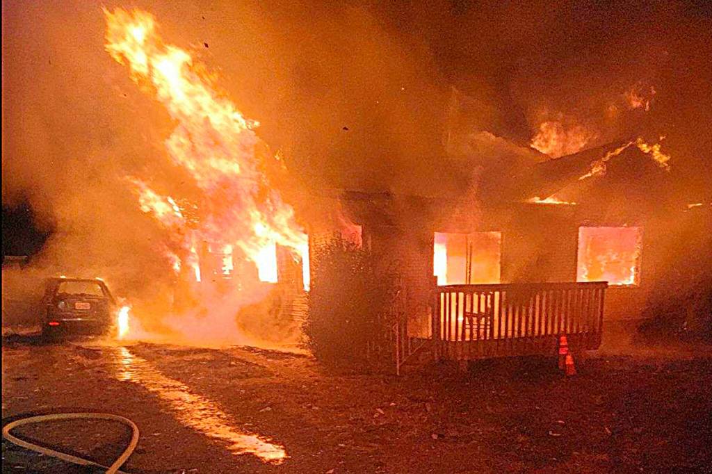 Photo courtesy Kevin Van De Wege/Clallam County Fire District 3
Firefighters extinguished a Dungeness house fire on Aug. 23 that started in the homes kitchen. It displaced a family of three who continue to seek a new home to rent.