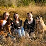 Photo courtesy Rachael Healey
Rachael Healey, on left, and her two daughters, Kaitlyn, 18, middle, and Kenzie, 16, right, lost their Dungeness home and two dogs Stella, front left, and Ollie, in a fire on Aug. 23. The family seeks a new place to rent as they live in a hotel while continuing to work and go to school.