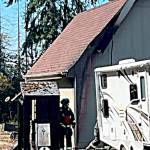 Photo courtesy of Chris Turner, Clallam County Fire District 3/ Clallam County Fire District 3 firefighters prevented a fire from spreading too far from a smoker to a two-story garage on Sept. 1 south of Sequim.