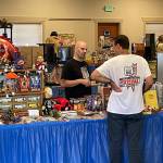 Sequim Gazette photo by Matthew Nash/ The Olympic Peninsula Toy and Collectibles Show hosted several vendors on Sept. 9 with a variety of toys for sale, including Star Wars, monsters, and cars.