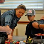Sequim Gazette photo by Matthew Nash
Mother-and-son Stephanie and eight-year-old Kosta Stamoolis look at a booth on Sept. 9 at the Olympic Peninsula Toy and Collectibles Show. Stephanie said her son loves toy cars so they were going to look around and find one toy to take home. Cartoon characters, Hot Wheels, monsters, superheroes, and more made appearances at the inaugural Olympic Peninsula Toy and Collectibles Show on Saturday. The event filled the Guy Cole Events Center in Carrie Blake Community Park with local and out-of-area vendors selling a variety of new and vintage toys. Organizer Corey Edwards said the venue worked beautifully, it was a gorgeous day, and spirits seemed to be riding high. I received many positive comments from shoppers and vendors throughout the day. Vendors all had fun, Edwards said, and they would like to do it again with details in the works about a possible show in spring 2024. For more information, visit peninsulatoyshow.com or facebook.com/groups/peninsulatoyshow.
