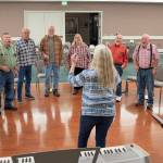 Sequim Gazette photo by Emily Matthiessen 
Members of the Juan de Fuca Harmony, a chapter of Barbershop Harmony Society, prepare last week for their 40th anniversary show, slated for 2p.m. on Saturday, Sept. 16, at Trinity United Methodist Church.