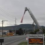 Sequim Gazette photo by Matthew Nash
A fire truck on Fifth Avenue displays an American flag on the 22nd anniversary of the 9/11 terrorist attacks.