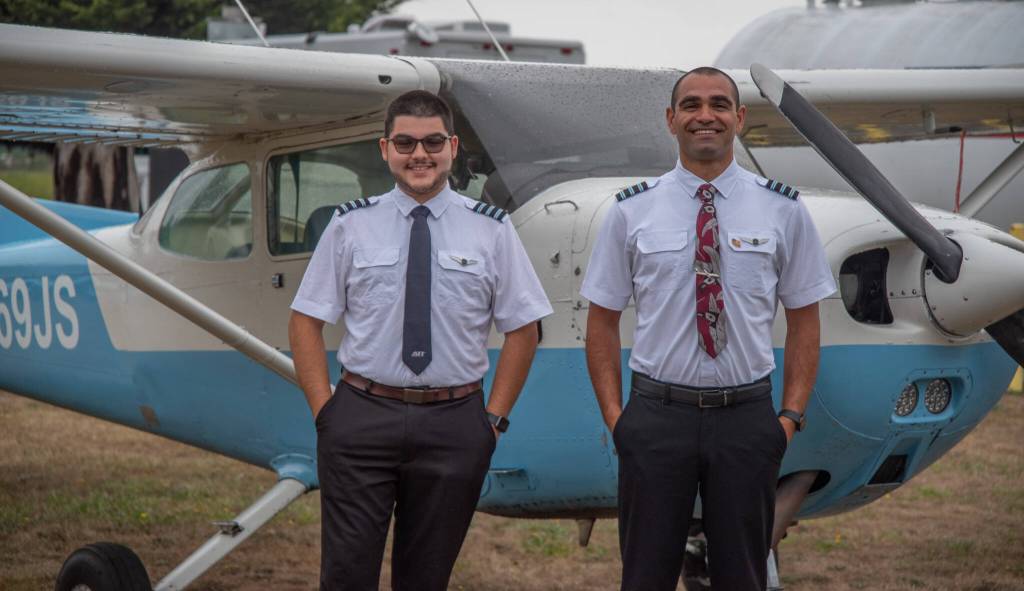 Sequim Gazette Photo by Emily Matthiessen
Aidan Lara, left, is one of Cenk Özers current students at the Anatolian Eagle Flight Academy, operated out of Sequim Valley Airport. Lara is studying for a private pilots license, an intense course of study that culminates in an oral exam and a flight exam which each take about three hours. The legal minimum flight hours is 40 per FAA to take the test, Özer said, but average US student takes 75 flight hours to be a pilot. On top of that, they spend an average of 150 hours studying for their exams. If you fail the test, it will be on your record and companies will hesitate to hire you as pilot.