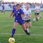 Sequim Gazette photo by Emily Matthiessen
Sequims Raimey Brewer, left gains possession as Port Angeles Izzy Felton pursues the play in a Sept. 14 Olympic League match-up in Sequim. The host Wolves won, 2-1.