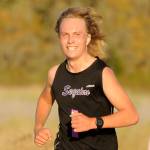 Sequim Gazette photo by Michael Dashiell / Sequims Solas McGruther races in an Olympic League cross country meet in Sequim on Sept. 20. McGruther was the top Wolf in the competition, finishing in xxxx place.