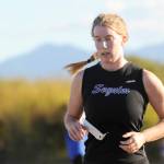 Sequim Gazette photo by Michael Dashiell / Sequims Krista Charters races in an Olympic League cross country meet in Sequim on Sept. 20.