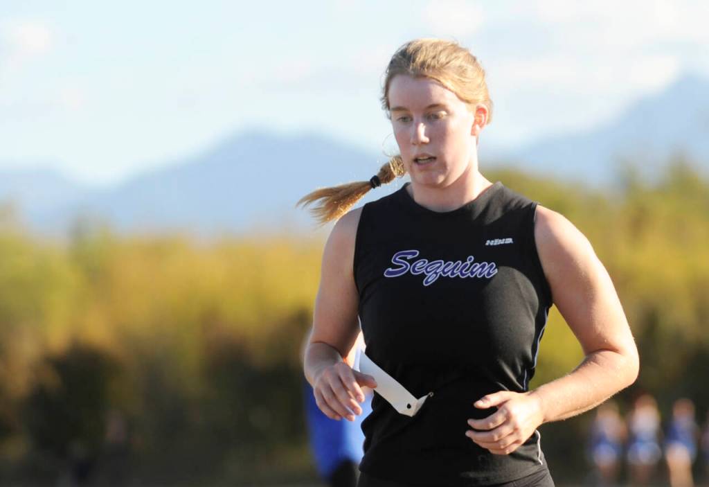 Sequim Gazette photo by Michael Dashiell / Sequims Krista Charters races in an Olympic League cross country meet in Sequim on Sept. 20.