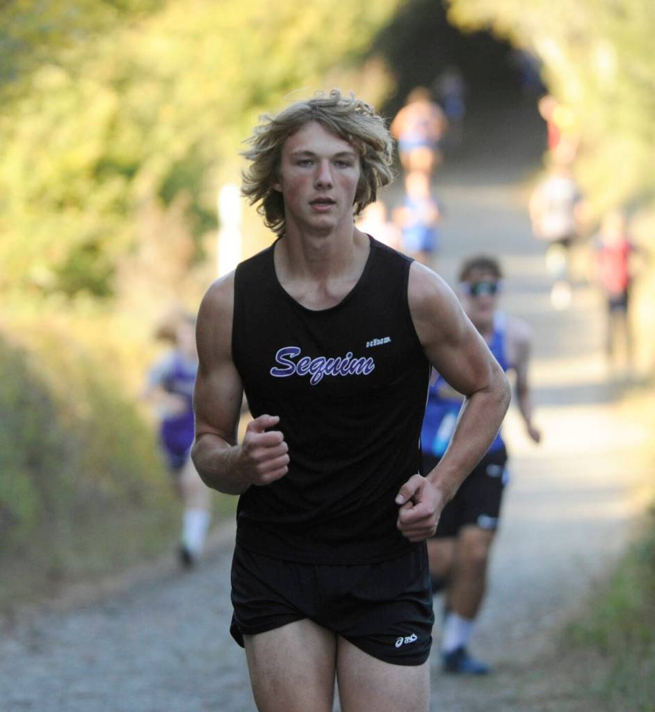 Sequim Gazette photo by Michael Dashiell / Sequims Ari Skov races in an Olympic League cross country meet in Sequim on Sept. 20.