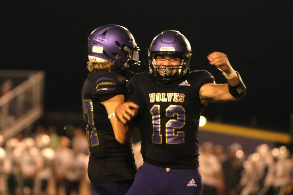 Sequim Gazette photo by Michael Dashiell / Sequims Liam Wiker celebrates his first half touchdown with a teammate in the Wolves league match-up with rival Port Angeles on Sept. 22.