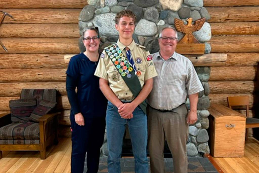 Photo courtesy Henninger family/ 
Jack Henninger recently received his Eagle Scout badge. Here he stands with mom Ann Marie and dad Ray.