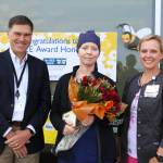 Photo courtesy of Olympic Medical Center
Jennifer McKee, an Olympic Medical Center ICU/telemetry certified nursing assistant (at center), receives a BEE (Being Excellent Every Day) Award from OMC CEO Darryl Wolfe and ICU/telemetry director Katrin Junghanns-Royack.