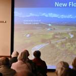 Sequim Gazette photo by Michael Dashiell / Cathy Lear, a biologist with the Clallam County Department of Community Developments Natural Resources department, gives background on the Lower Dungeness River Floodplain Restoration at a Sept. 26 public meeting in Sequim.