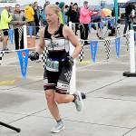 KEITH THORPE/PENINSULA DAILY NEWS
Jennifer Higgins of Bozeman, Mont., crosses the line as top womans racer in the ironman category of Saturday's Big Hurt in Port Angeles.
