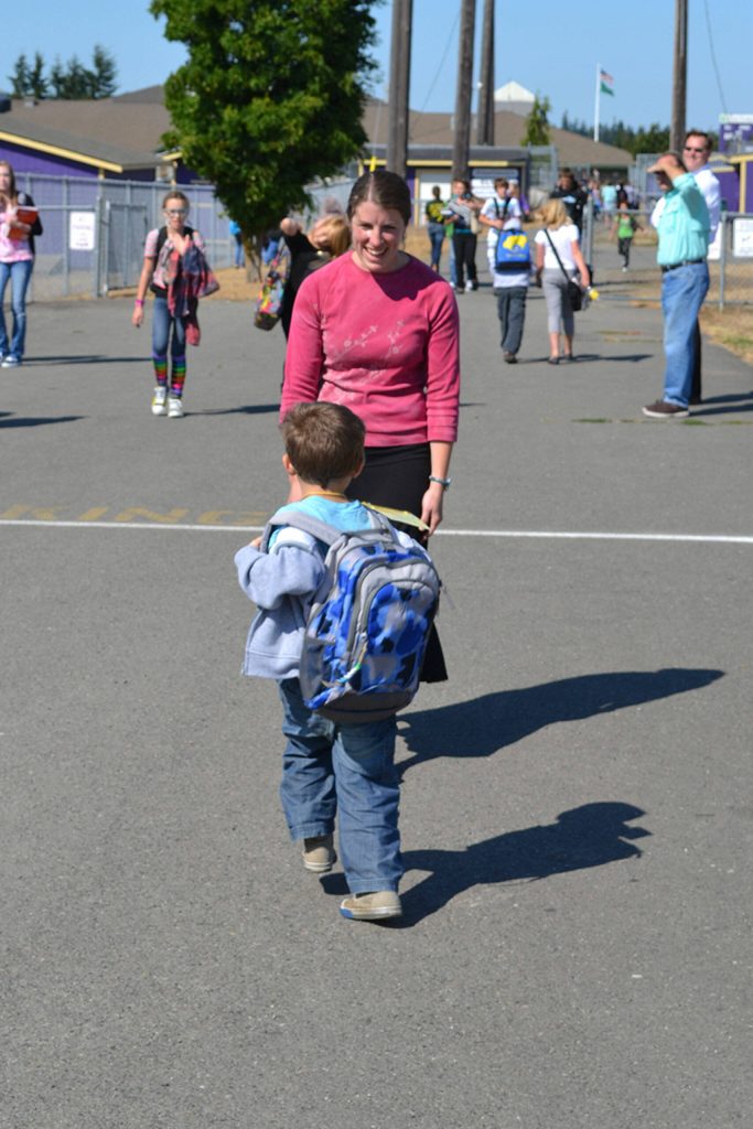 Five-year-old Win Jones greets his mom Laura Gould after his first day of kindergarten in 2011.