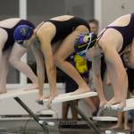 Sequim Gazette photo by Michael Dashiell / Sequims Ava Shinkle, right, prepares to break from the starters block in the 50 free event as Sequim takes on Bremerton at home on Sept. 27. Shinkle took second in 28.50 seconds, behind Bremertons Gabbie Pattie (25.46).