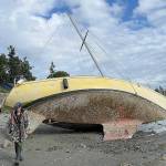 Sequim Gazette photos by Matthew Nash
Pat Spradling Jr.s boat Dire Straits was pulled from the beach near John Wayne Marina on Sept. 29. Hes had the boat a few years, he said, and hopes to go sailing more often.
