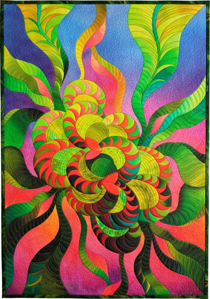 Artwork courtesy of Cary Bryer Fallert-Gentry / Garden Party 3 by Cary Bryer Fallert-Gentry, a participant in the Spinning Sewn Stories – Promulgate, Piece, & Ply exhibit hosted by the North Olympic Fiber Arts Festival.