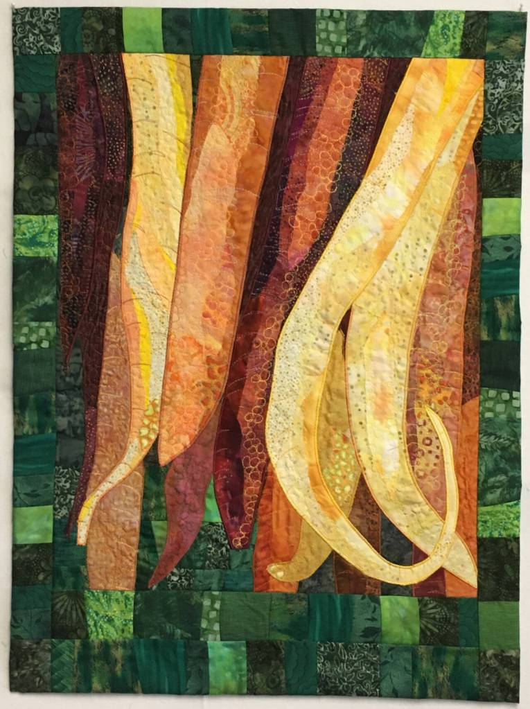 Artwork by Liisa Fagerlund / Artwork by Liisa Fagerlund, a participant in the Spinning Sewn Stories – Promulgate, Piece, & Ply exhibit hosted by the North Olympic Fiber Arts Festival.