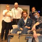 Sequim Gazette photo by Matthew Nash
A group of survivors, from left, Christina Parker (playing Helen), Hunter Gilliam (Harry), Justin Stapleton (Ben), Audrey Cabage (Barbara), and Matt Forrest (Tom) learn from the television that a virus has spread across the globe in Olympic Theatre Arts Night of the Living Dead and is causing the dead to return.