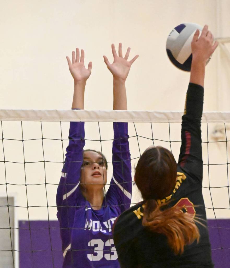 Sequims Arianna Stovall, left, looks to block a shot by Kingstons Lucy Patricio in an Oct. 3 league match-up.