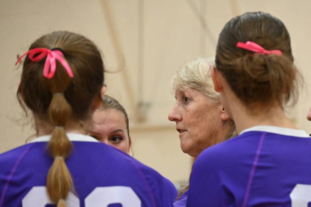 Sequim Gazette photo by Michael Dashiell / Sequim High head coach Jennie Webber Heilman talks with her squad in an Oct. 3 match against Kingston. The Wolves won in four games.