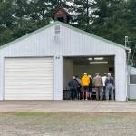 Residents fill an open bay of Clallam County Fire District 3s Lost Mountain Station 36 on Oct. 9 where they expressed concerns about the district selling the station.
