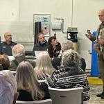 Sequim Gazette photo by Matthew Nash
Resident Tom Harris tells neighbors and Clallam County Fire District 3 leaders on Oct. 9 that its incredibly important to keep (Lost Mountain Station 36). If it sells, were not going to get it back.