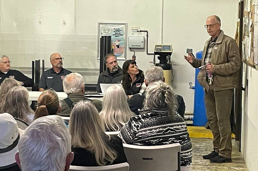 Sequim Gazette photo by Matthew Nash
Resident Tom Harris tells neighbors and Clallam County Fire District 3 leaders on Oct. 9 that its incredibly important to keep (Lost Mountain Station 36). If it sells, were not going to get it back.