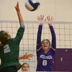 Sequim Gazette photo by Michael Dashiell / Sequims Rose Gibson, right, looks to block a volley by Port Angeles Mary Halberg in an Oct. 10 Olympic League match.