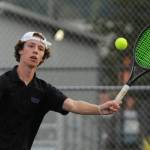 Sequims Garrett Little returns a volley as he takes on Port Angeles C.J. Elliott on Oct. 11 in Sequim. Little won the match and improved his season record to 12-0 later in the week.