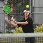 Sequims Garrett Little returns a volley as he takes on Port Angeles C.J. Elliott on Oct. 11 in Sequim. Little won the match and improved his season record to 12-0 later in the week.