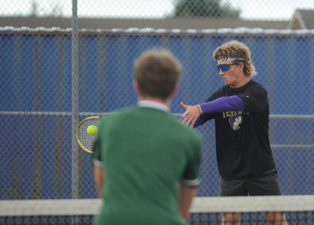 Sequim Gazette photo by Michael Dashiell / Sequims Hunter Tennell, right and doubles partner Sebastian Buhrer take on Port Angeles Tate Alton and Luke Floodstrom in an Oct. 11 league match in Sequim.