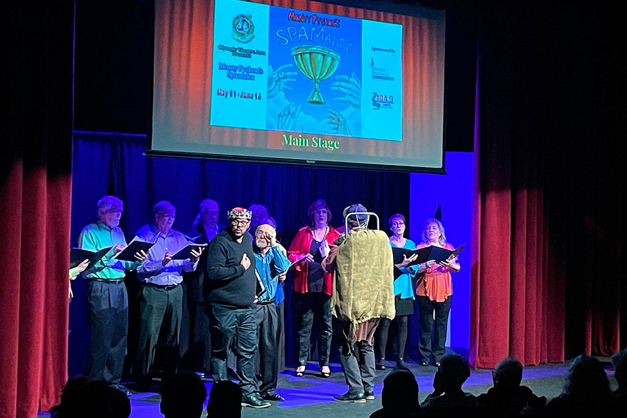 Sequim Gazette photo by Matthew Nash
Monty Pythons Spamalot is one of the many shows next year at Olympic Theatre Arts. During the 2024 season preview on Oct. 8, Kyle LeMaire, as King Arthur, sings Im All Alone with help from Morgan Bartholick, as Patsy the squire, who conducts the OTA Players.