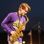 Sequim High senior Anton Himillsson plays a saxophone solo rendition of the Star-Spangled Banner for the 2023 Homecoming crowd just prior to SHSs football game on Oct. 13.