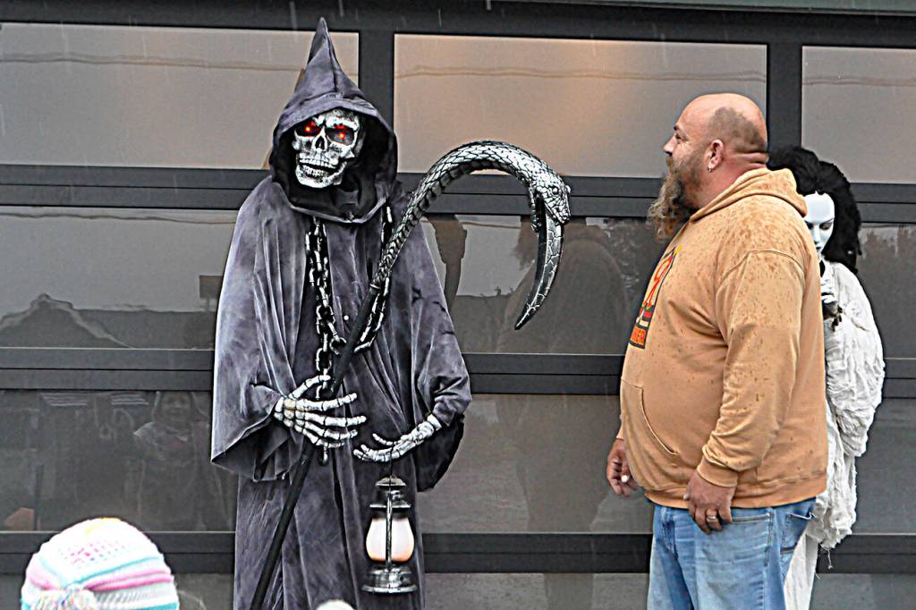 Sequim Gazette photo by Matthew Nash/ One of Josh Hennings favorite decorations is an animatronic grim reaper by his garage.