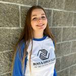 Sequim Gazette photo by Matthew Nash/ Pearle Peterson, 18, stands outside Sequims Carroll C. Kendall Unit of the Boys & Girls Club where shes attended for 11 years. Shell represent the local club and national organization on Oct. 28 at the World Series where shell sing the National Anthem.