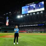 Photo by Daniel Shirey/MLB Photos
Pearle Peterson of Sequim sings The Star-Spangled Banner at the World Series on Oct. 28 in Arlington, Texas. Peterson said she was fulfilling what my younger self always wanted to do on the national stage.