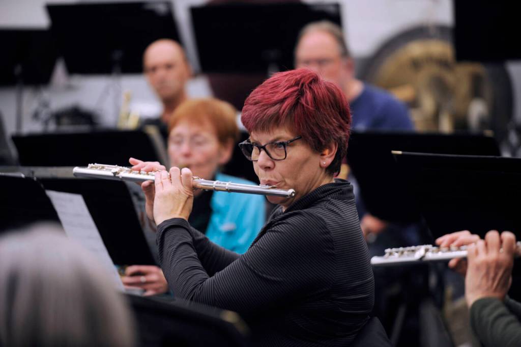Sequim Gazette photo by Michael Dashiell / Konni Boll and other Sequim City Band members fine tune some pieces at the bands rehearsal on Oct. 25.