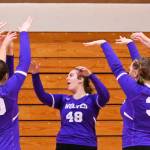 Sequim Gazette photo by Michael Dashiell / Sequims Sydney Hegvedt (48) and teammates celebrate a big block in a three-set sweep of Bremerton on Oct. 24.