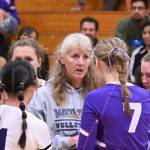 Sequim Gazette photo by Michael Dashiell / Sequim head coach Jennie Webber Heilman talks with Tiffany Lam (1), Sydney Clark (7) and other SHS players between sets of an Oct. 24 sweep of Bremerton.