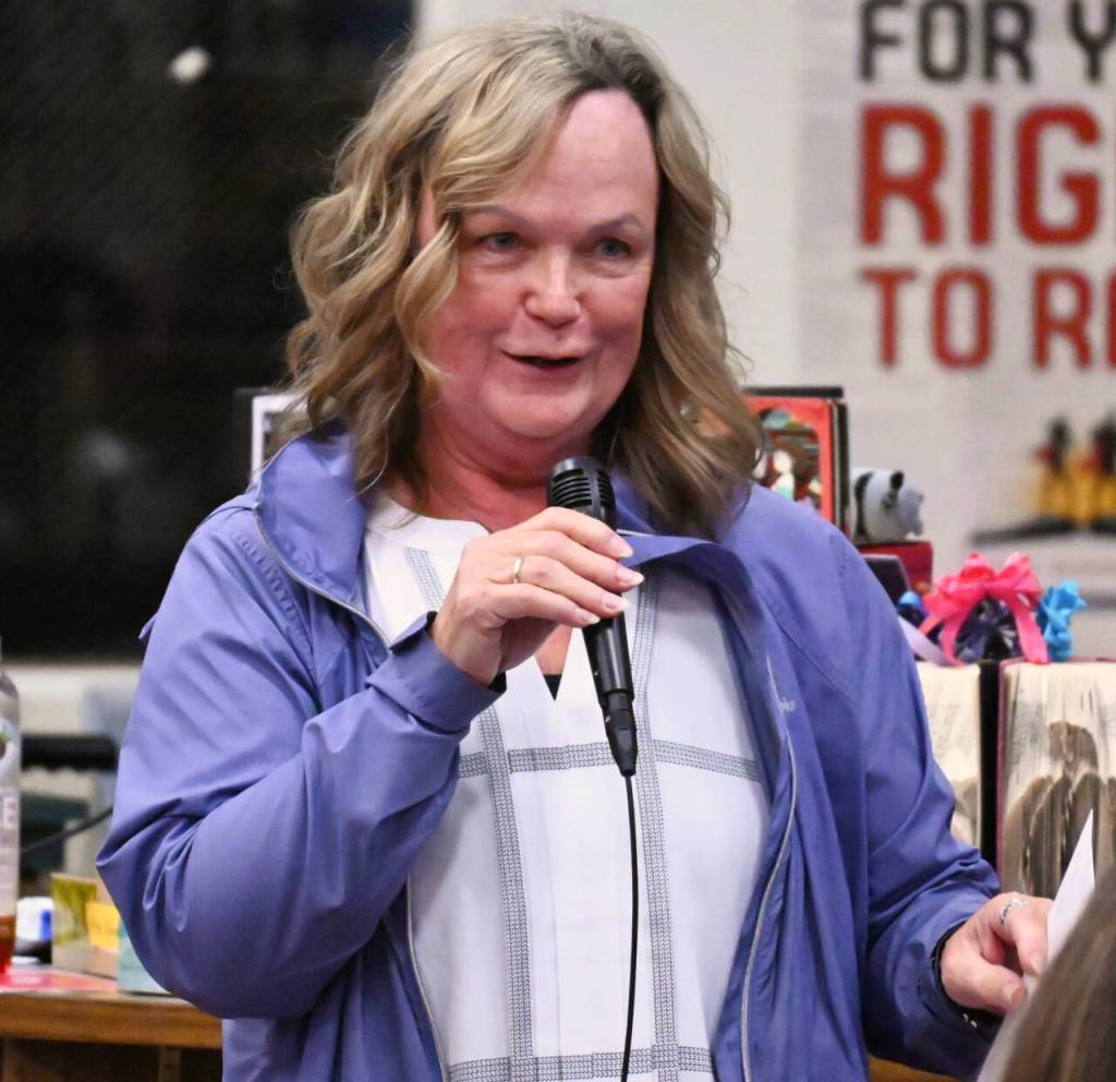 Sequim Gazette photo by Michael Dashiell / Pat Soderlind, executive director of the Forks Community Food Bank, accepts an Albert Haller Foundation grant award at a special ceremony on Oct. 24 in Sequim.