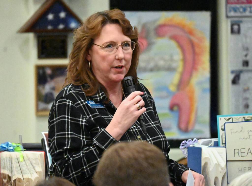 Sequim Gazette photo by Michael Dashiell / Sara Nicholls, executive director of the Dungeness Valley health and Wellness Clinic, accepts a $9,500 grant ward from the the Albert Haller Foundation at an Oct. 24 ceremony in Sequim.