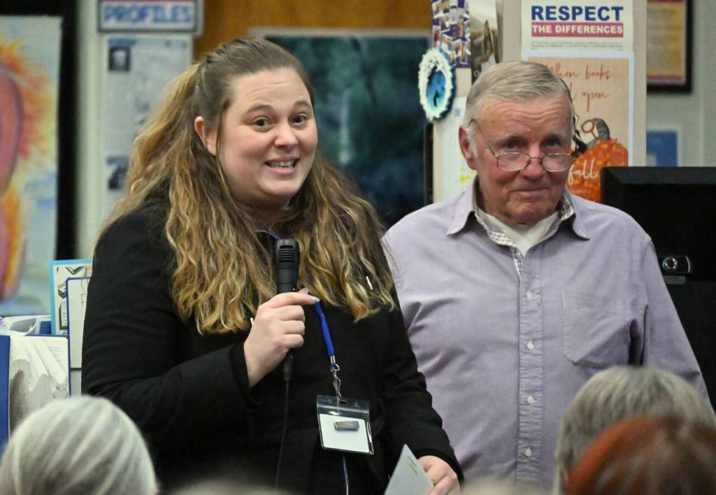 Sequim Gazette photo by Michael Dashiell / Angel Dennis, Development Director at Peninsula Behavioral Health, thanks board president Gary Smith and other Albert Haller Foundation representatives for a grant award at an Oct. 24 ceremony in Sequim.
