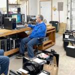 Photo courtesy Sequim PC Users Group/ Members of the Sequim PC Users Group work on refurbishing donated computers so they can provide them to in-need individuals or groups. The group will soon pivot to focus on refurbishing laptop computers only, they said.