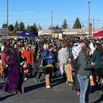 Sequim Gazette photo by Matthew Nash/ People fill the rows for the Olympic Peninsula Rat Racers Trunk-or-Treat on Oct. 28.