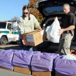 Helen Kenoyer of the Olympic Peninsula Community Clinic and Inspector Josh Ley of the Clallam County Sheriffs Office unload unwanted pharmaceuticals and medications from the agency at a drop-off point at the Clallam County Courthouse during Saturday's National Prescription Drug Take Back Day. At the event, people were allowed to get rid of unwanted or expired drugs for disposal in a safe and responsible manner. Additional drop-off points on Saturday were at Sequim City Hall and the QFC grocery store in Port Hadlock. Year-round drug disposal sites are kiosks at the Clallam County Sheriff's Office in Port Angeles, at the Sequim Police Department and through the Jefferson County Sheriff's Office in Port Hadlock. (Keith Thorpe/Peninsula Daily News)