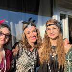 Sequim Gazette photo by Matthew Nash/ Flappers, from left, Alyssa Shepherd, Ashley Possin, Annaliece Possin and Alexis Shepherd hand out candy in front of Cedarbrook Lavender on Halloween. It was their second year in a group costume, Alyssa said.
