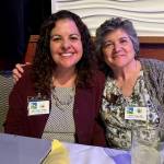 Photo courtesy of P.E.O. 
At left, Suzanne Ames, Peninsula College president and keynote speaker, enjoys a moment with Rose Fowler, P.E.O. Washington State Chapter president.