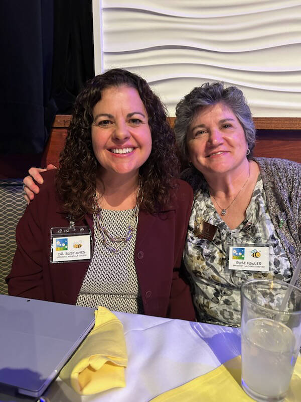 Photo courtesy of P.E.O. 
At left, Suzanne Ames, Peninsula College president and keynote speaker, enjoys a moment with Rose Fowler, P.E.O. Washington State Chapter president.